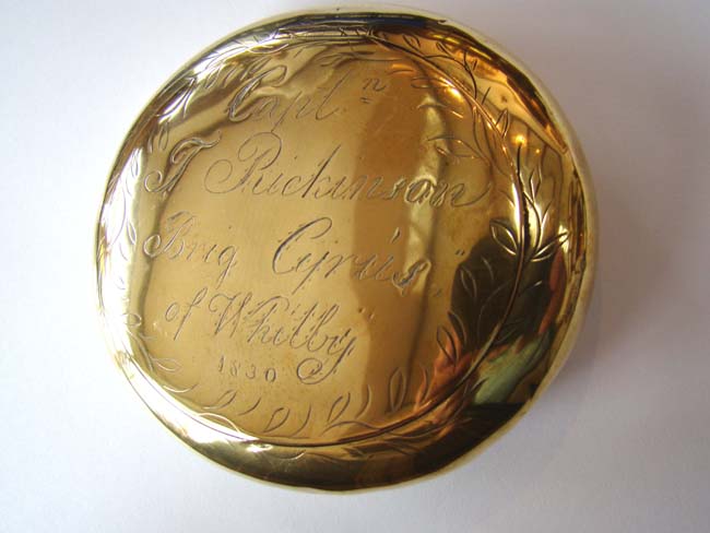 An early 19th century engraved Ship Captain's Brass Tobacco Box dated 1830